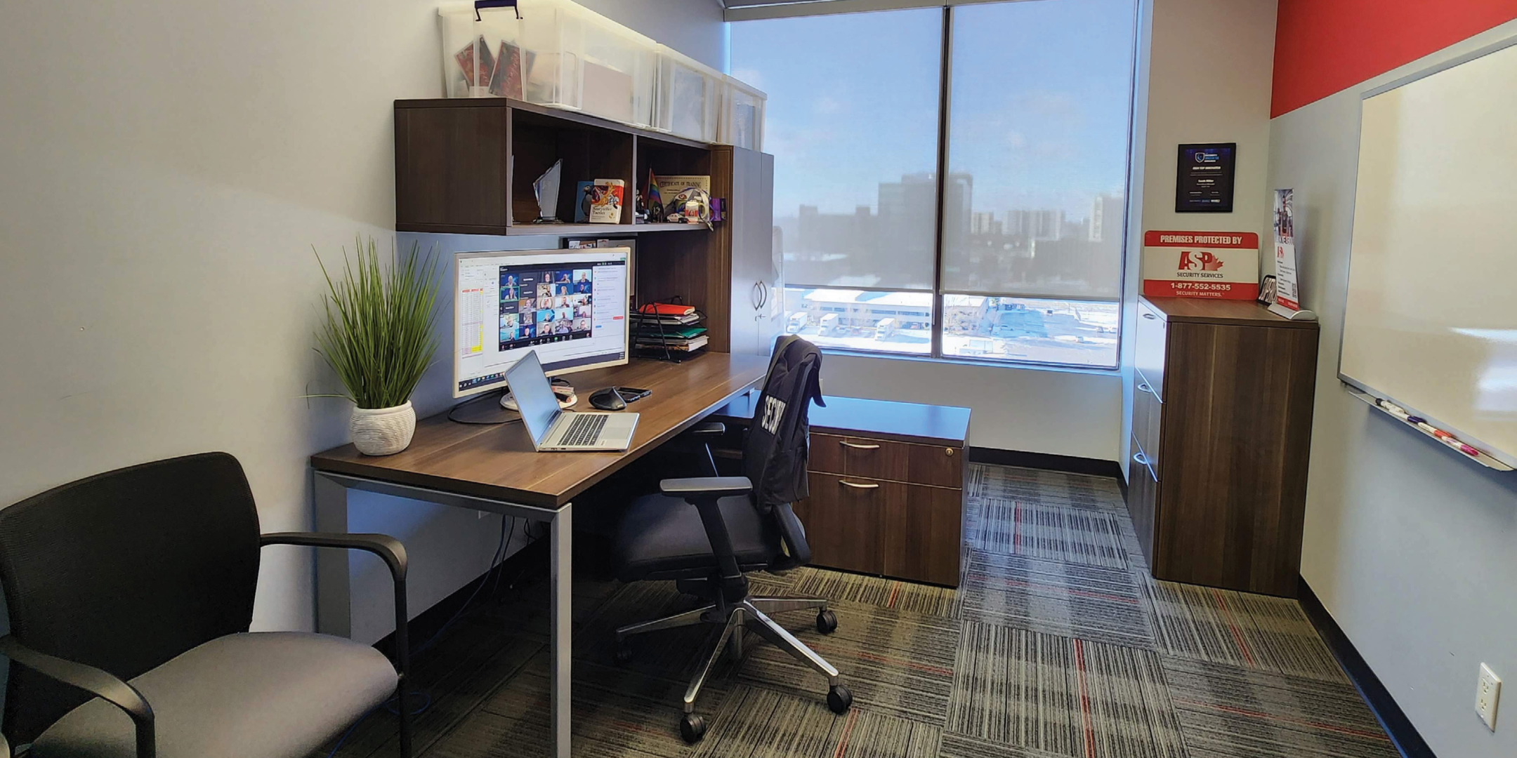 200 Consumers Road private office with chairs, desk, white board, and cabinet