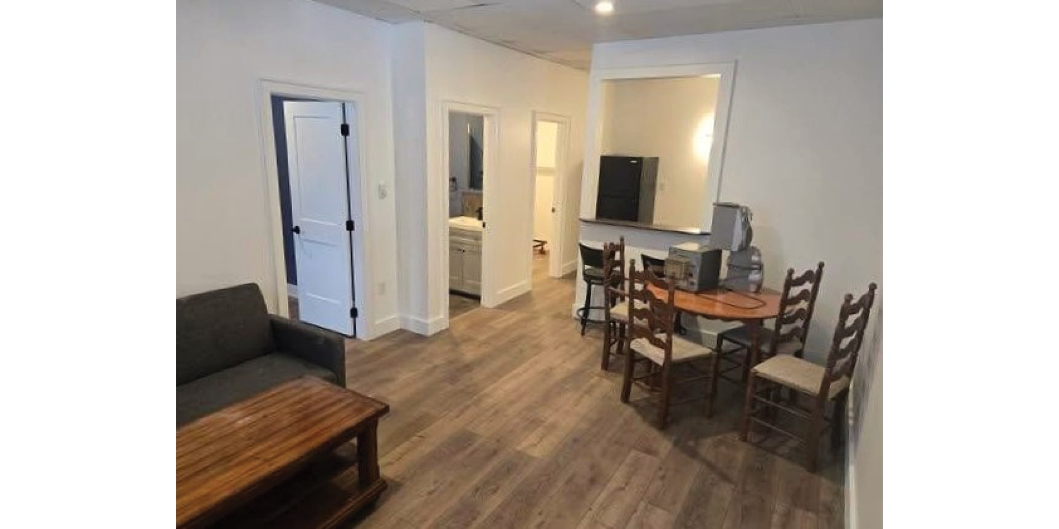 310 Taylor Road Interior Living Room Area with tables, chairs and sofa