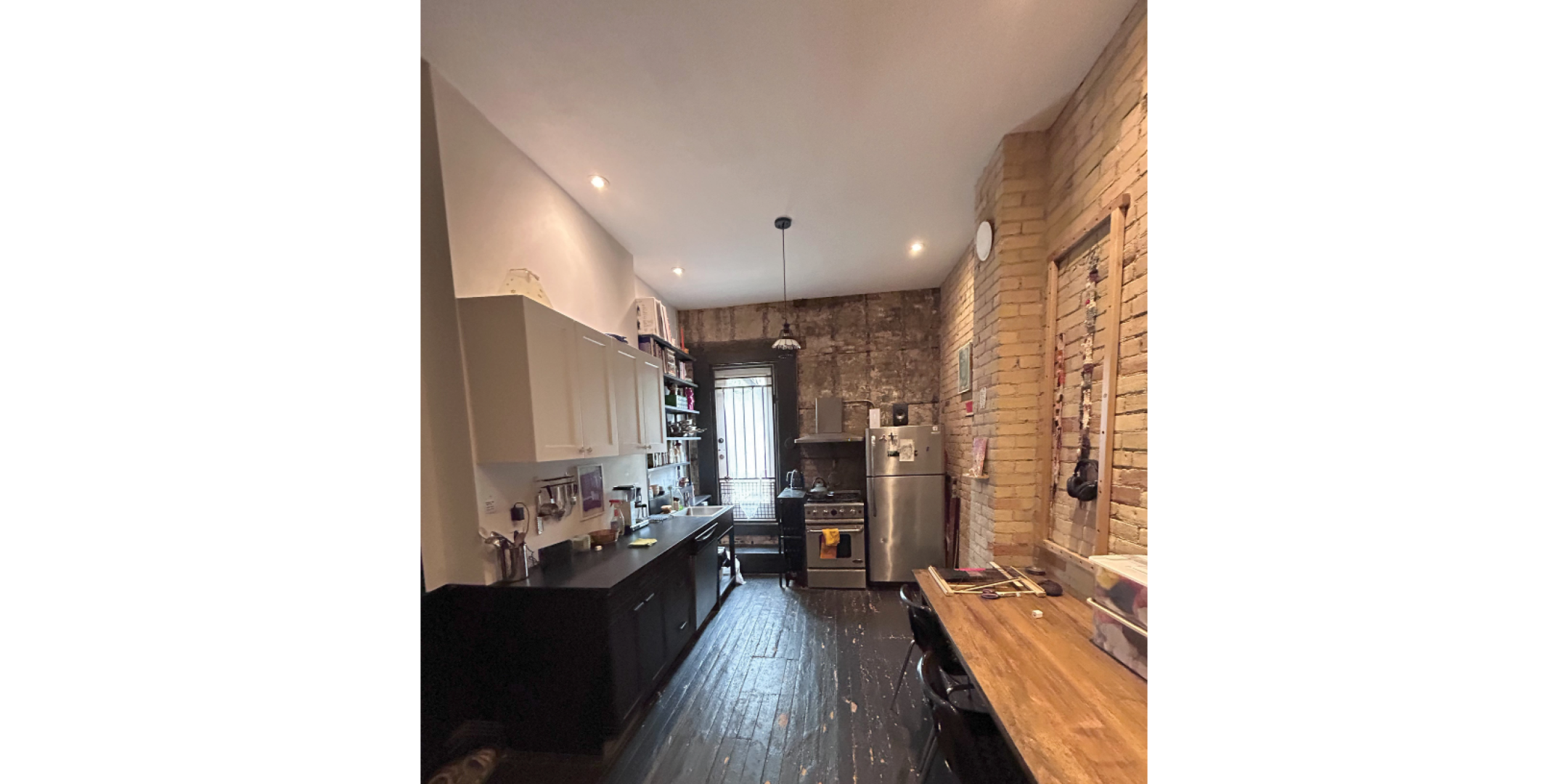 781 Queen Street E Apartment Area Kitchen with Fridge, Stove, Counter Space and Door