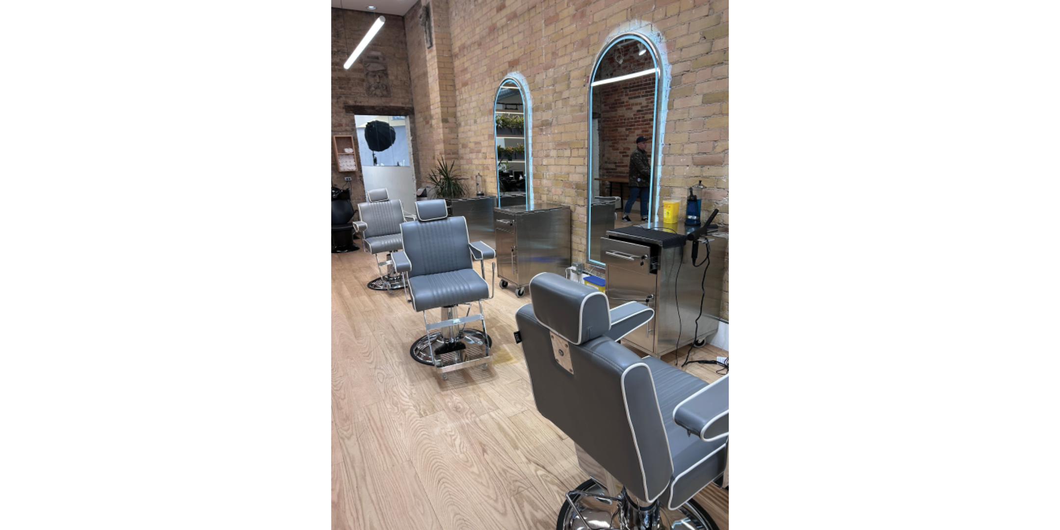 781 Queen Street E Retail Area, Salon Area with Chairs and Mirrors