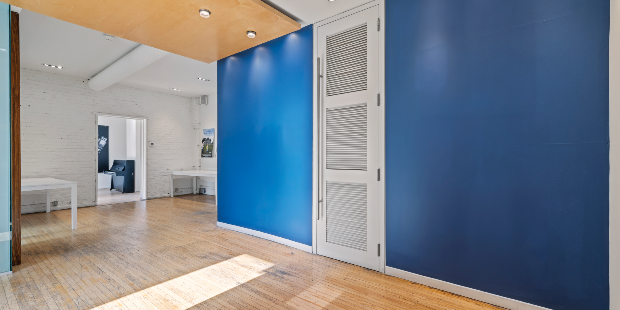 1058 Yonge interior space with blue wall