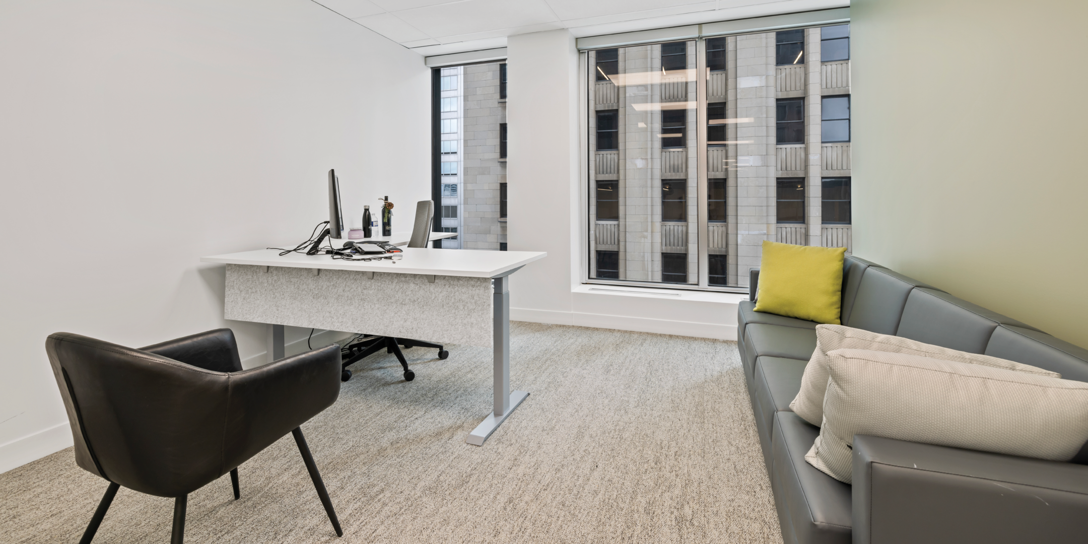 11 King Street West office with sofa and window 