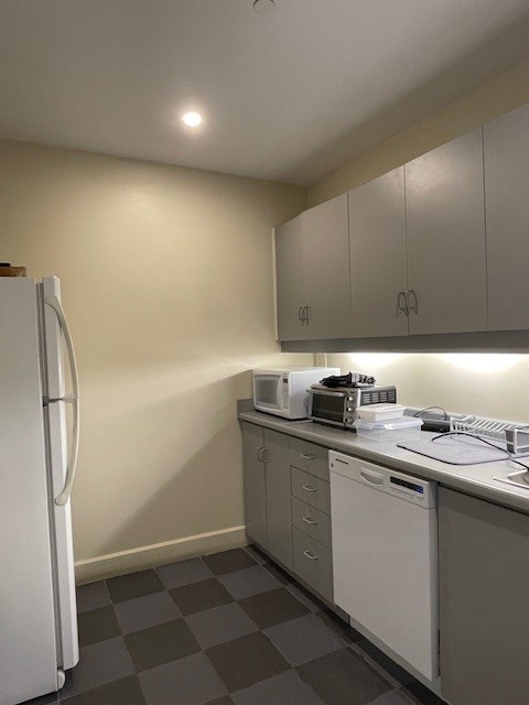 160 Pears Avenue Kitchen with fridge and cabinet