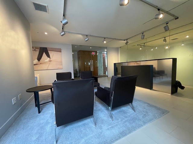 160 Pears Avenue Public area with chairs and table