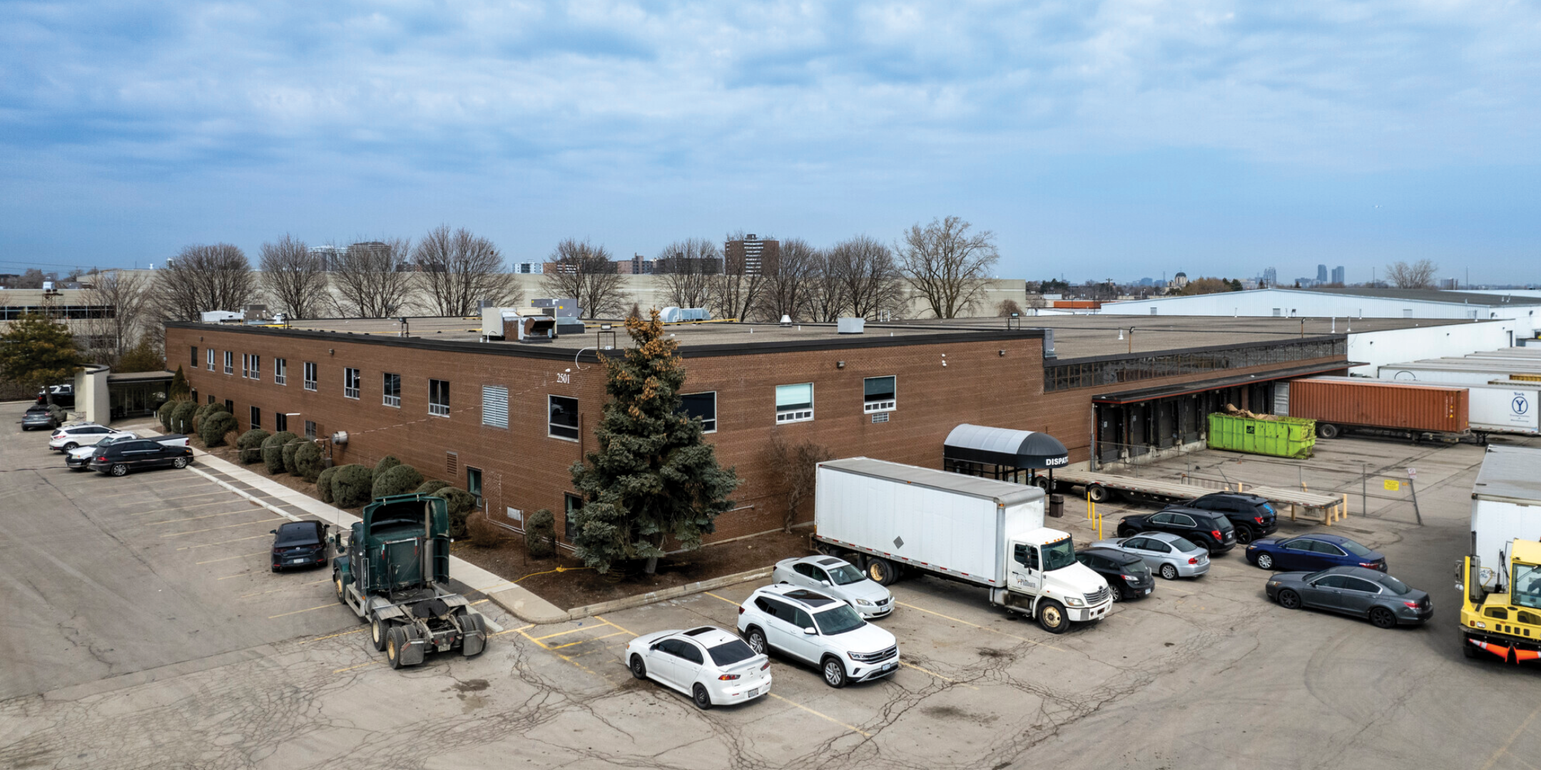 elevated image of back of industrial building showing shipping apron