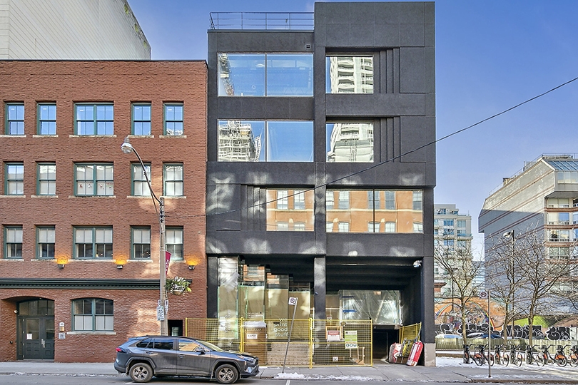 101 Richmond St E exterior view of the building and brown building besides