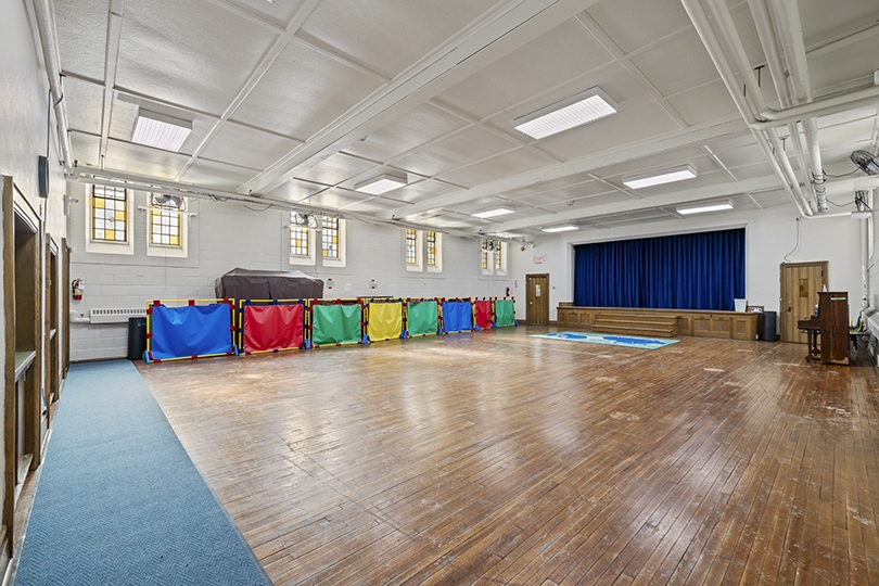 1847 Bayview Ave interior view of hall with platform
