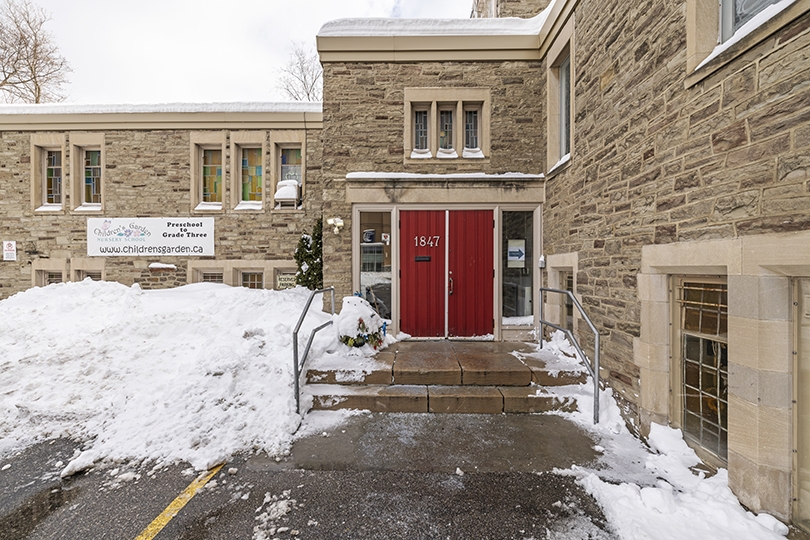 1847 Bayview Ave exterior of the red front door with stairs