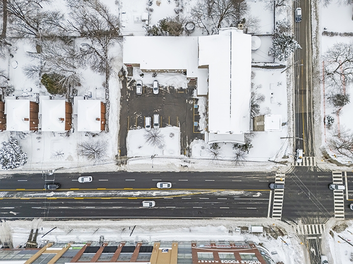1847 Bayview Ave aerial view of the building and with roof covered with snow