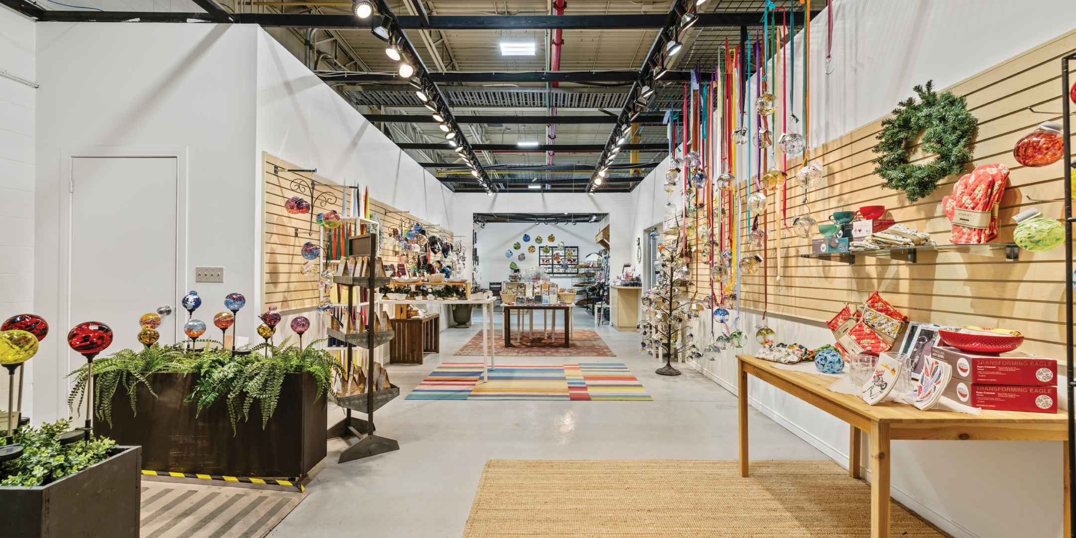 530 Dickson Dr interior view of retail space featuring handcrafted and artistic items.