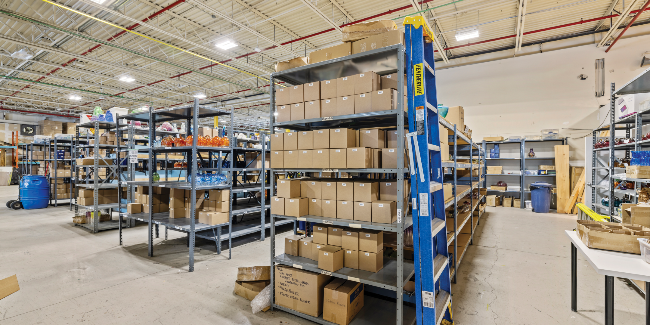 530 Dickson Dr interior view of warehouse filled with storage shelves.