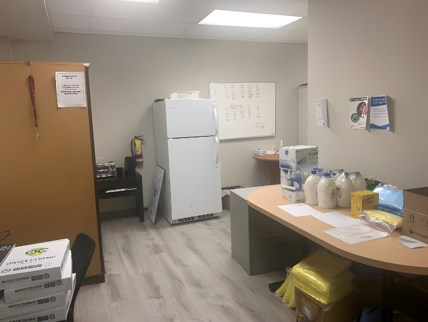 10132 Yonge Street private office with a fridge beside the desk
