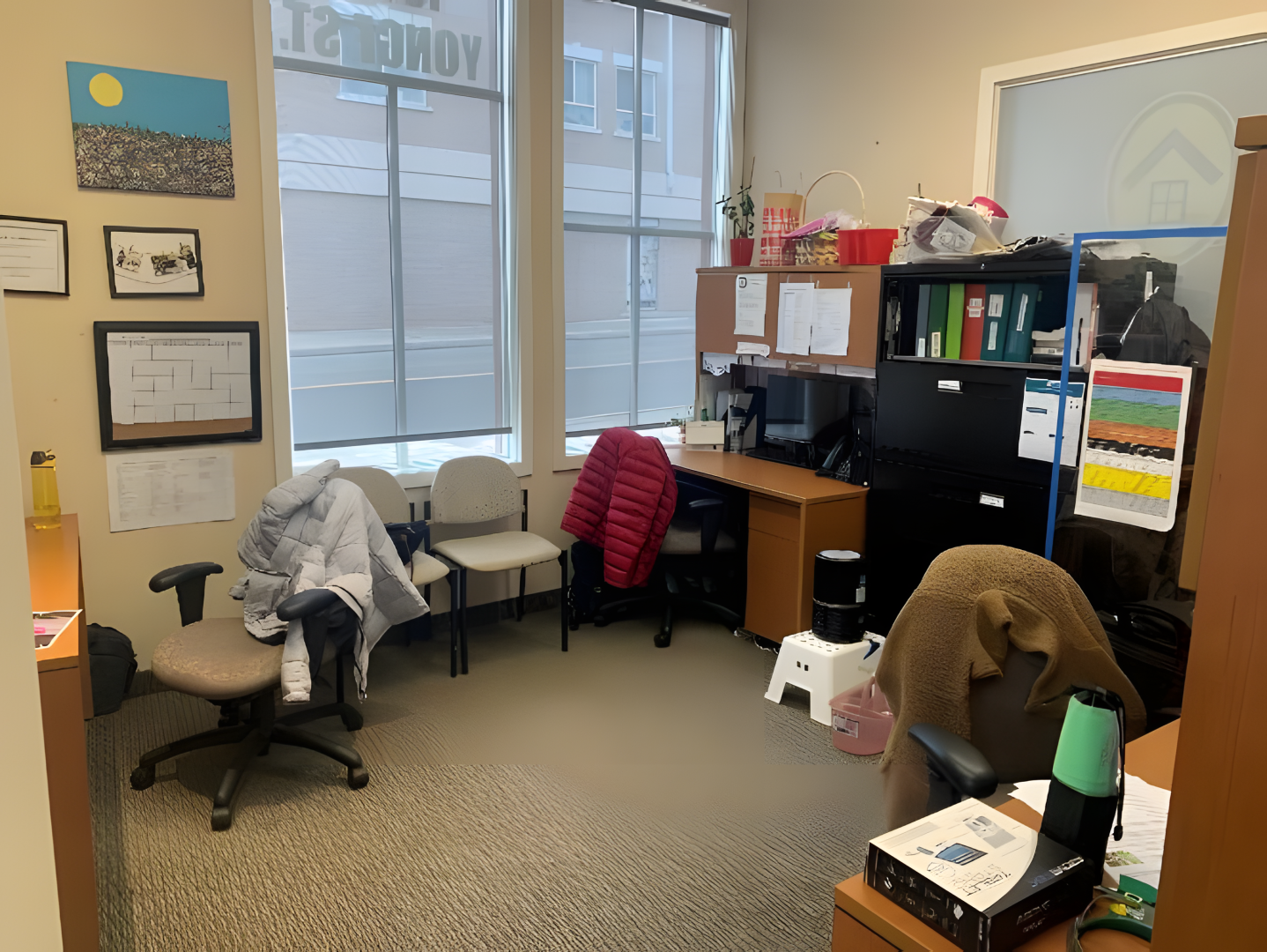 10132 Yonge Street office with the window overlooking the desk and chairs