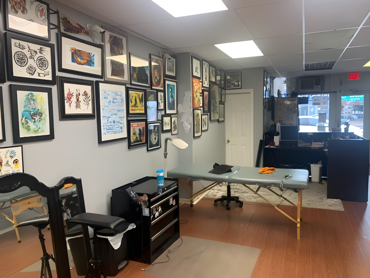 10140 Yonge Street open area with street level door and picrues on the wall