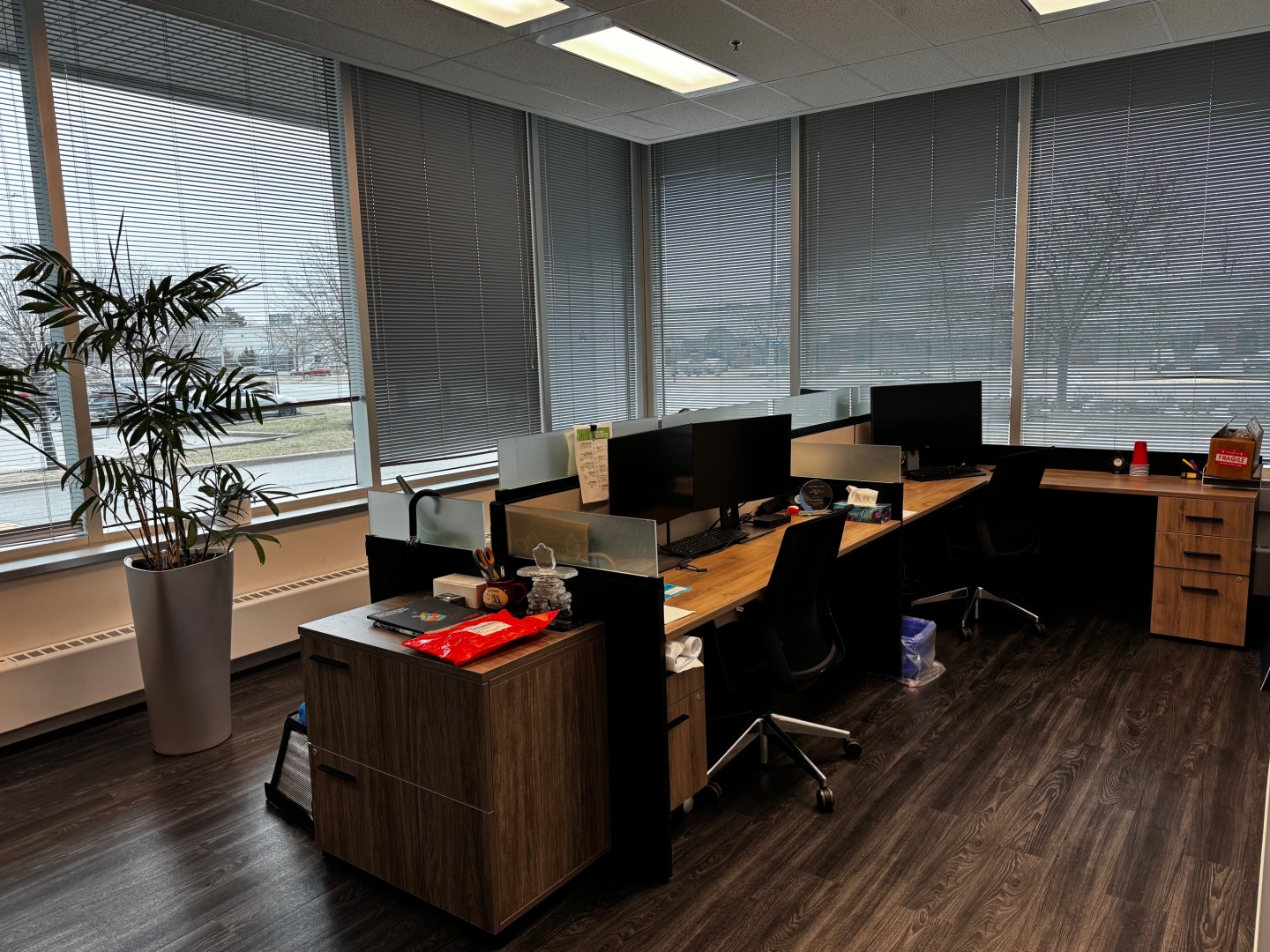 2680 Matheson Blvd E office area corner view with desks and plants