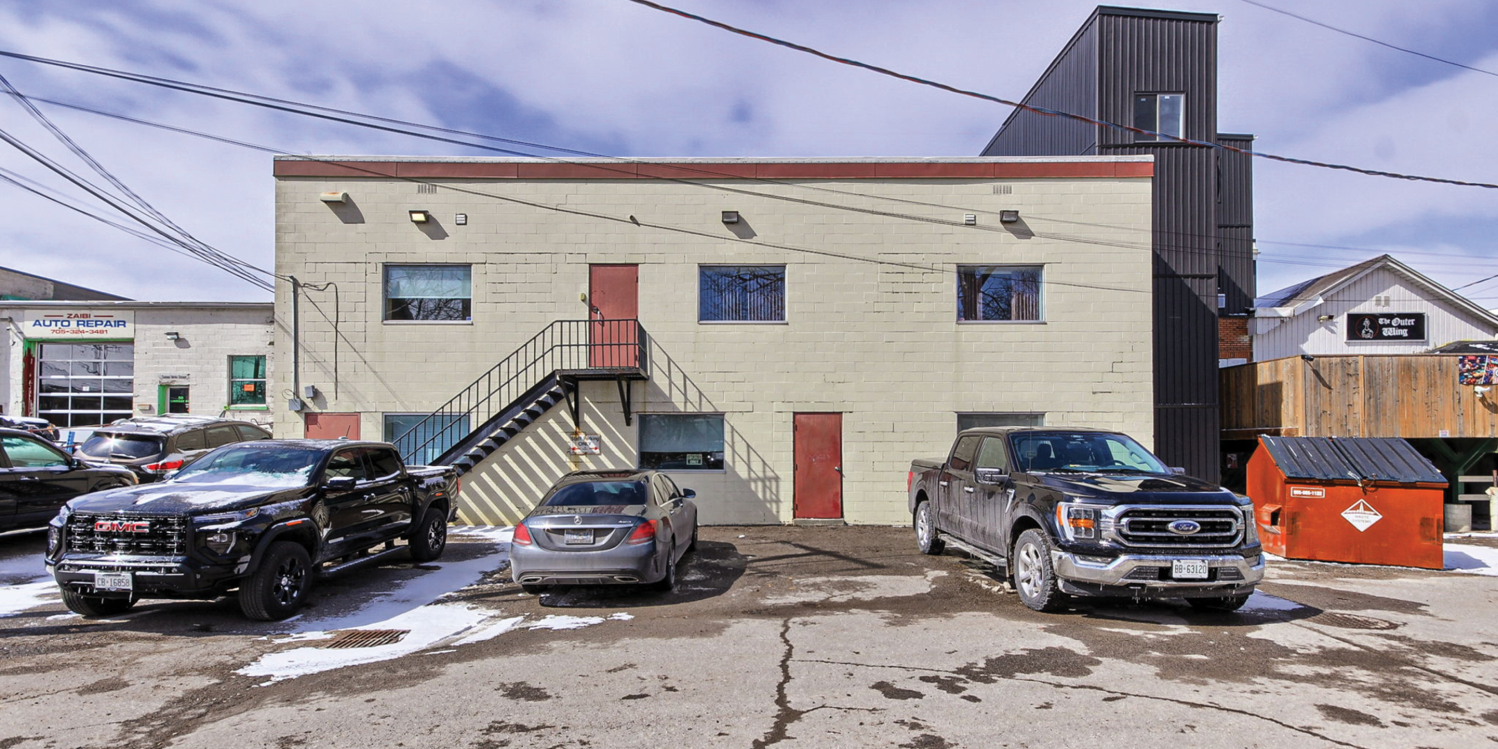 40 Lindsay Street S Back of Building with dedicated parking spots