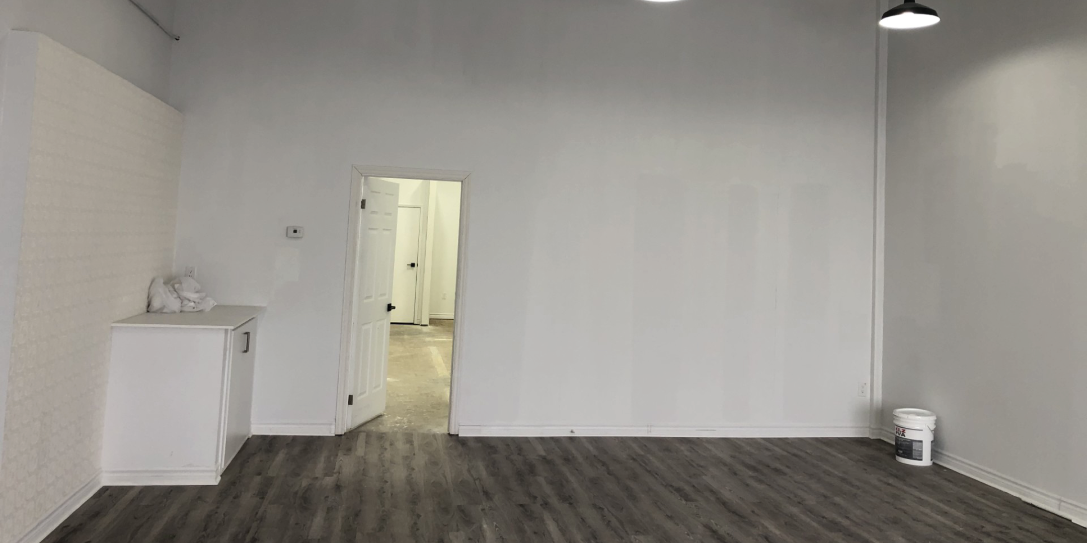450 Alden Road Interior Open Office Area with white walls and concrete floors