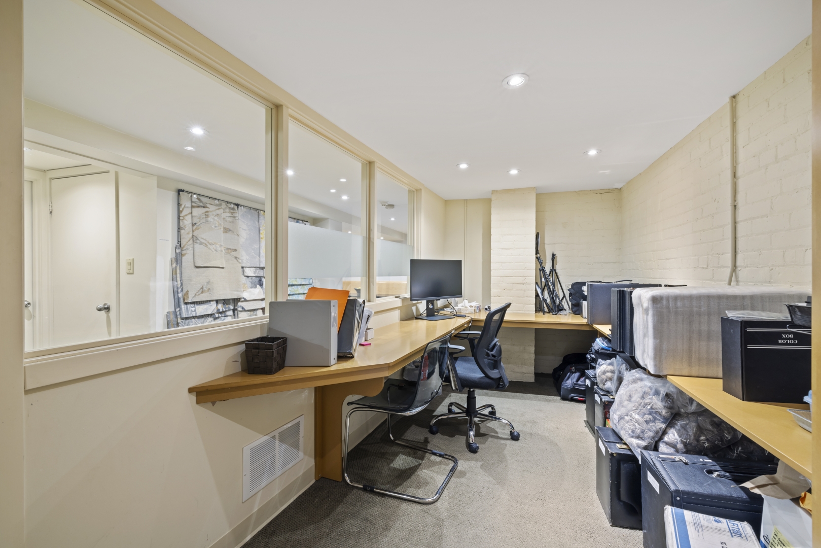 532 Annette Street Basement office area with several desks and chairs