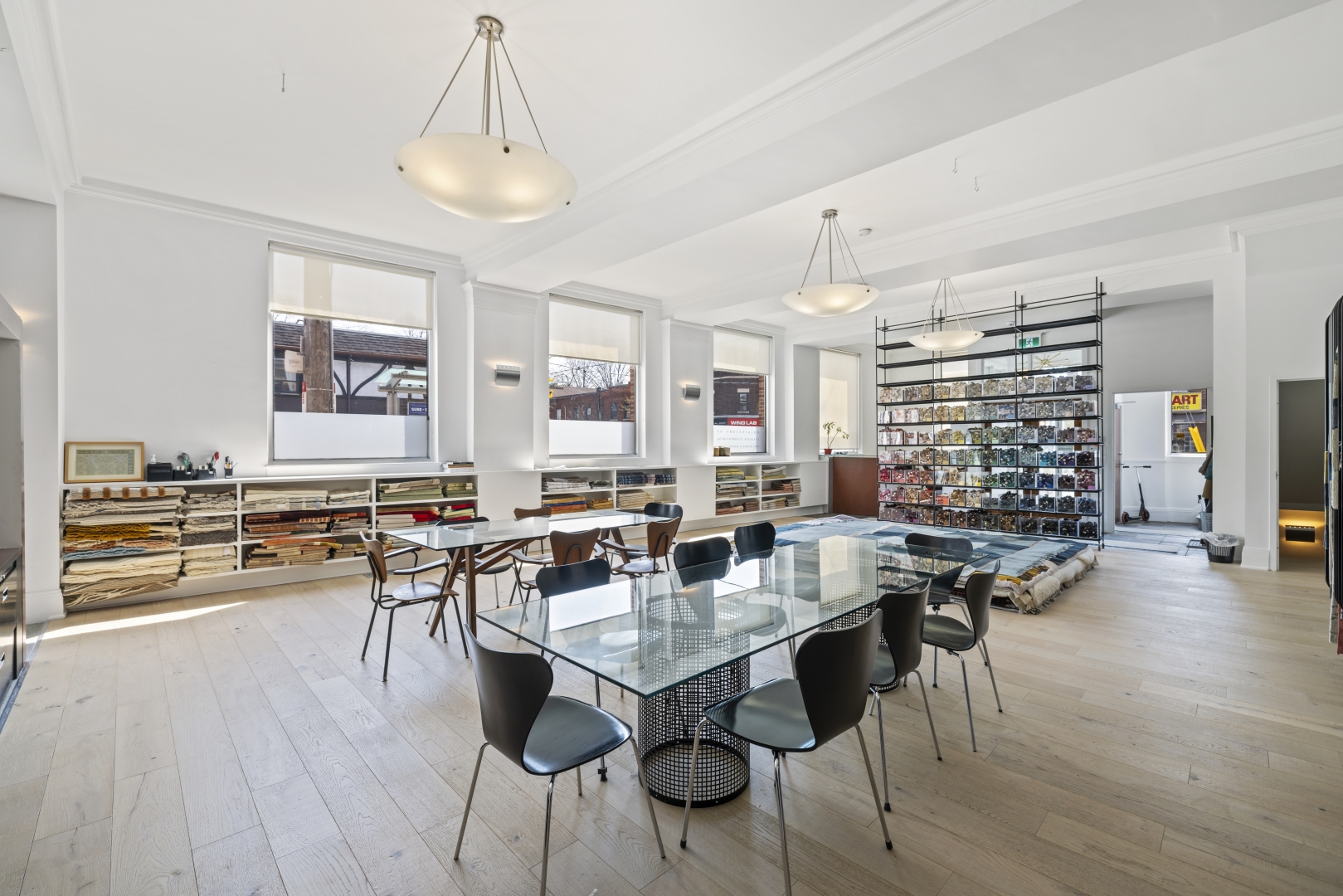 532 Annette Street Ground Floor open area with several windows overlooking a glass desk and chairs
