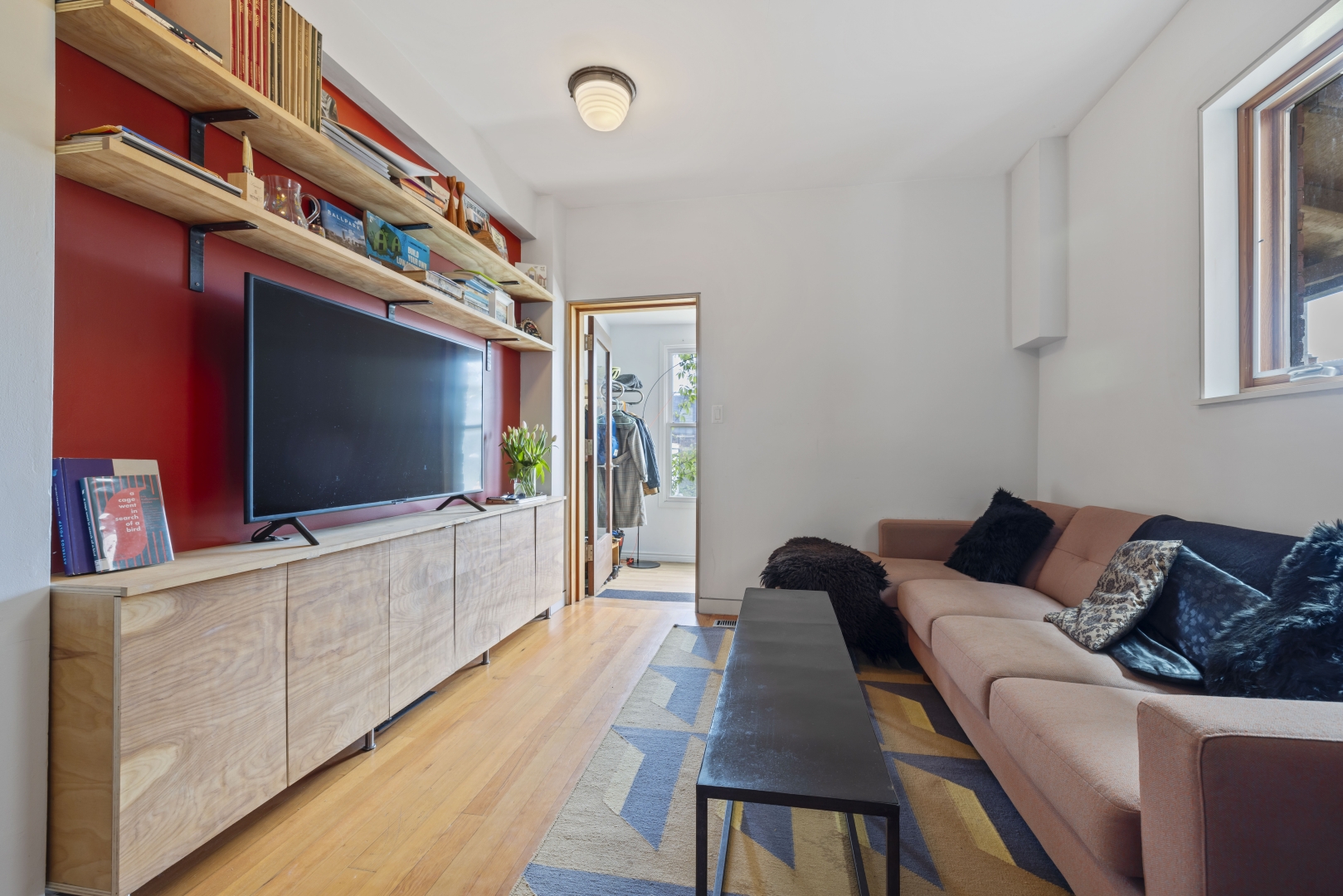 1157 Davenport Road livingroom with TV, table and sofa
