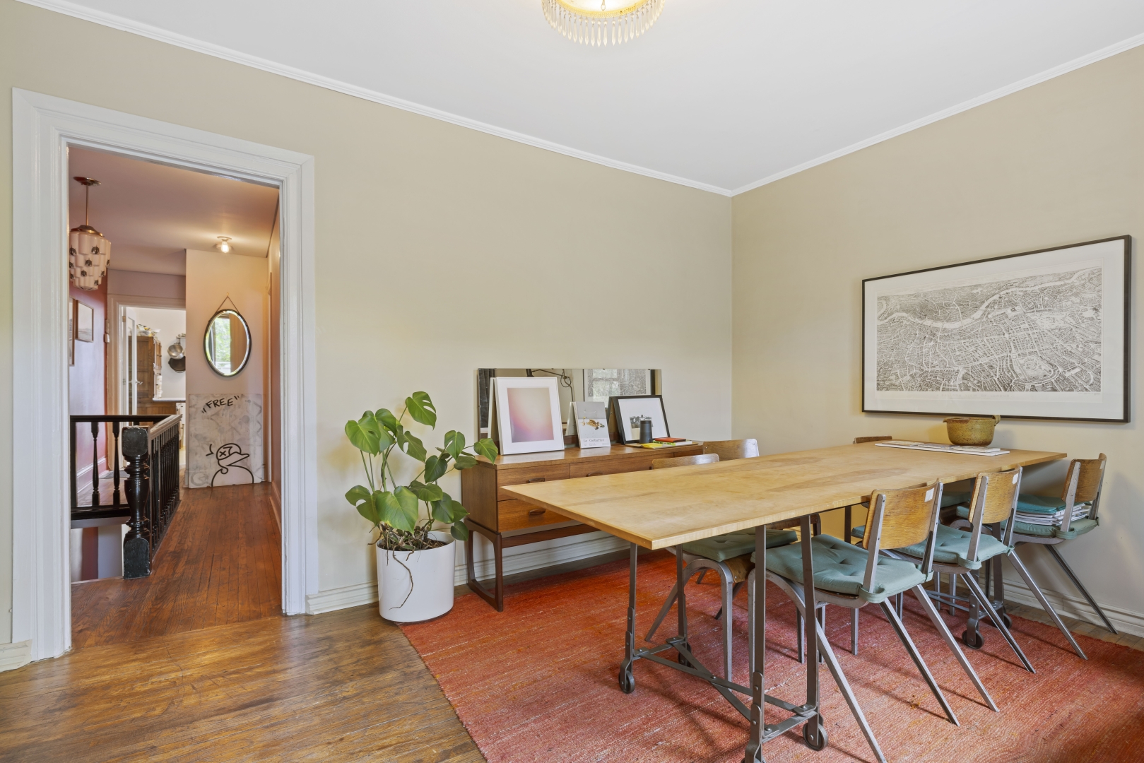 1157 Davenport Road 2nd floor dining area with a big table, chairs, and plant