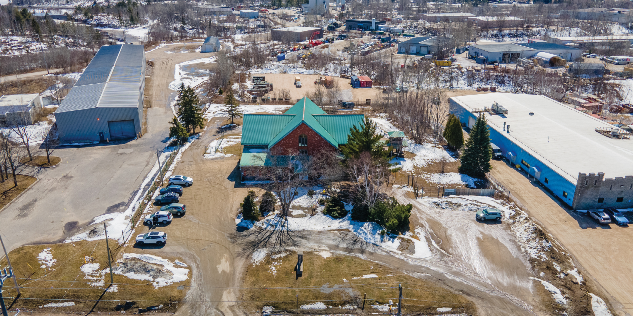 Aerial of Red Brick Farm House style Veterinary Clinic