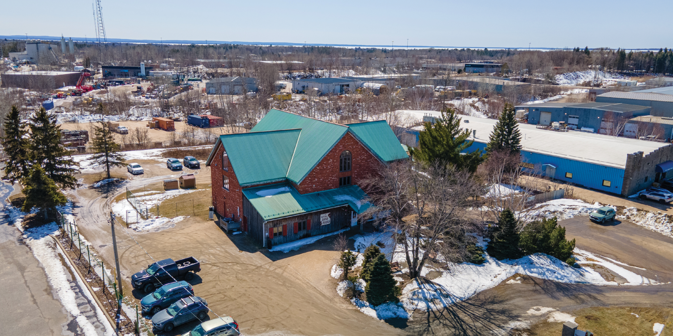 Aerial of Red Brick Farm House style Veterinary Clinic