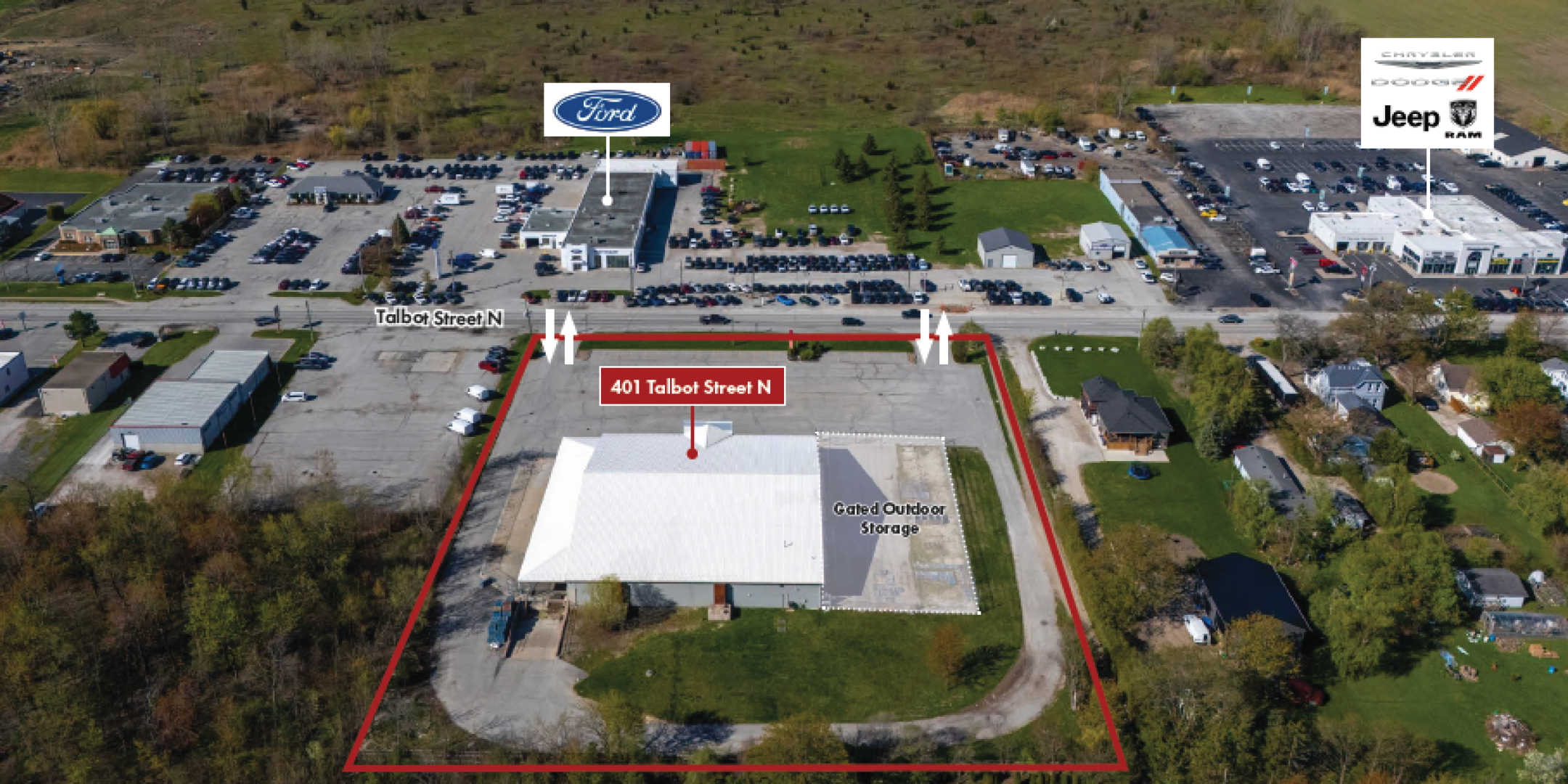 Aerial of Former Peavey Mart Store in Essex, taken from rear of site, showing retail buildings across the street