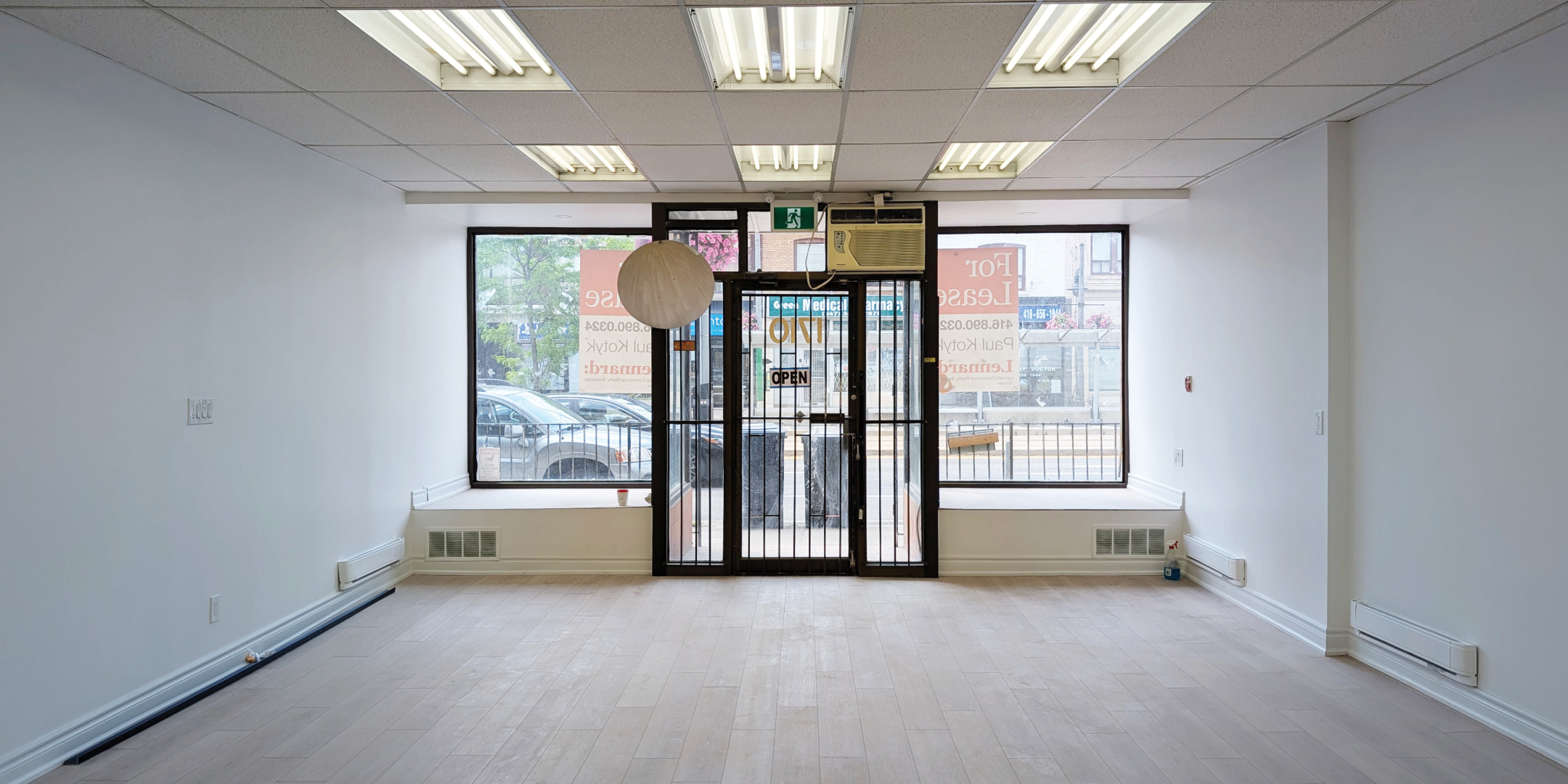1710 St. Clair Avenue W Interior Facing Front Entrance with Large glass doors