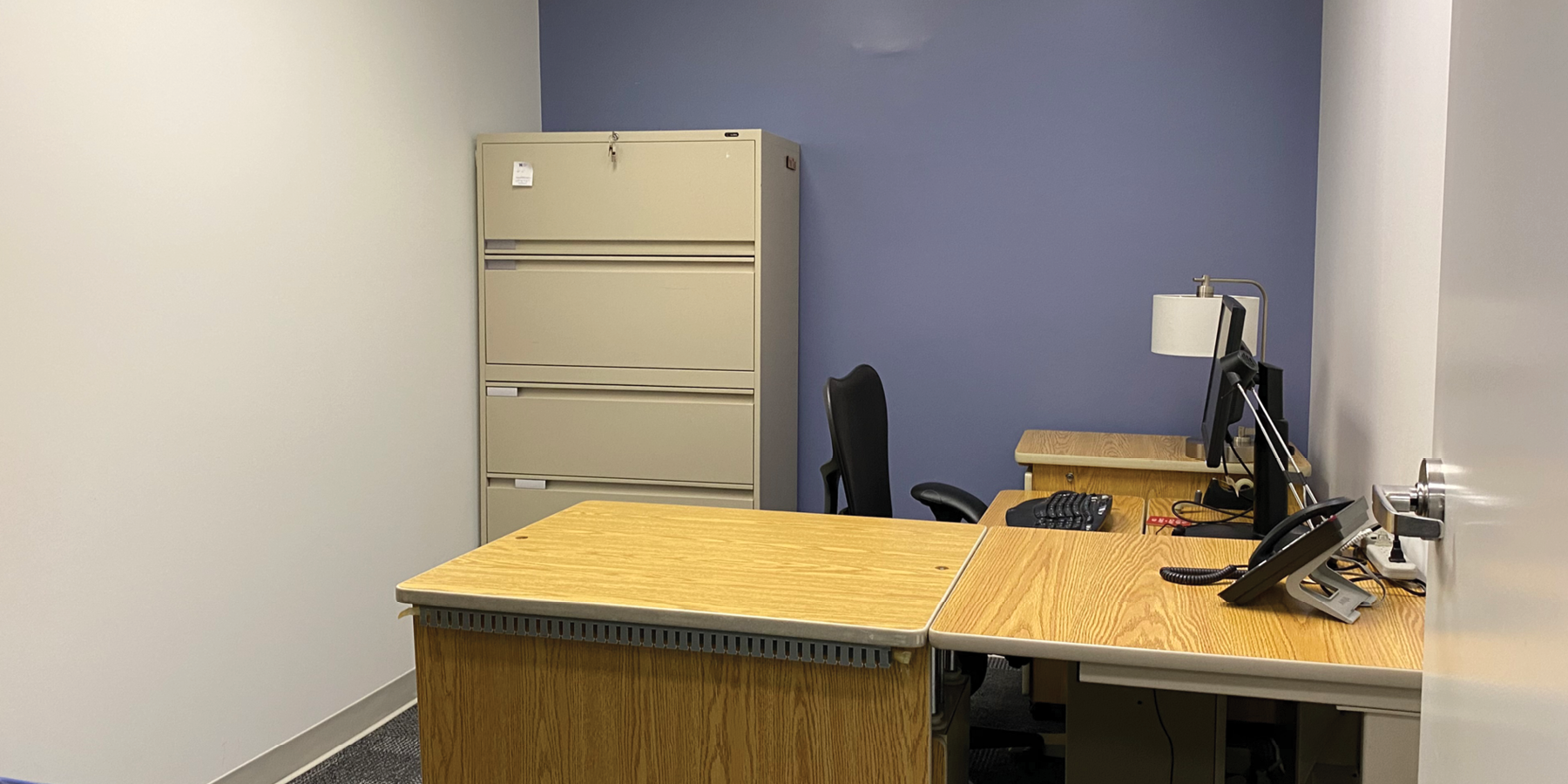 400 University Ave interior view of private office with desk and monitor