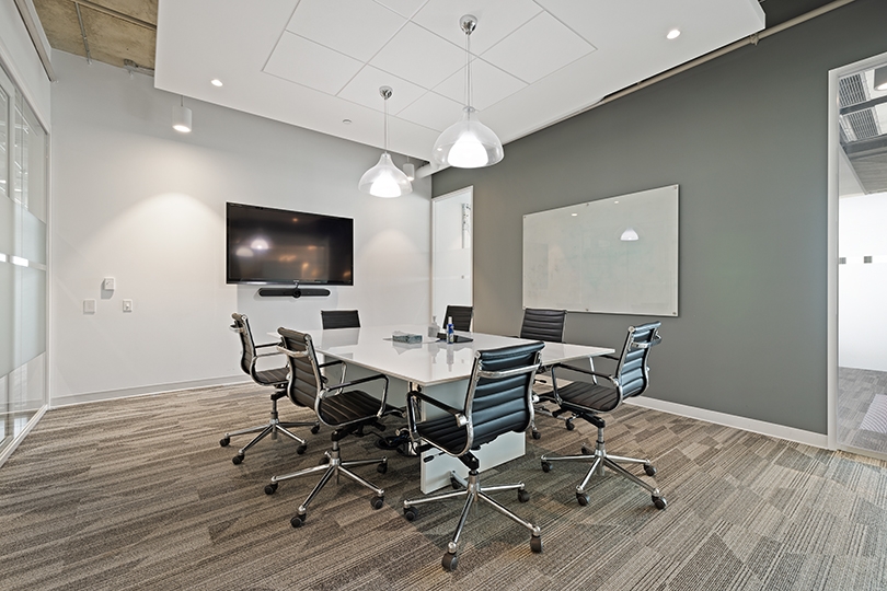 5015 Spectrum Way interior view of boardroom with desk and chairs
