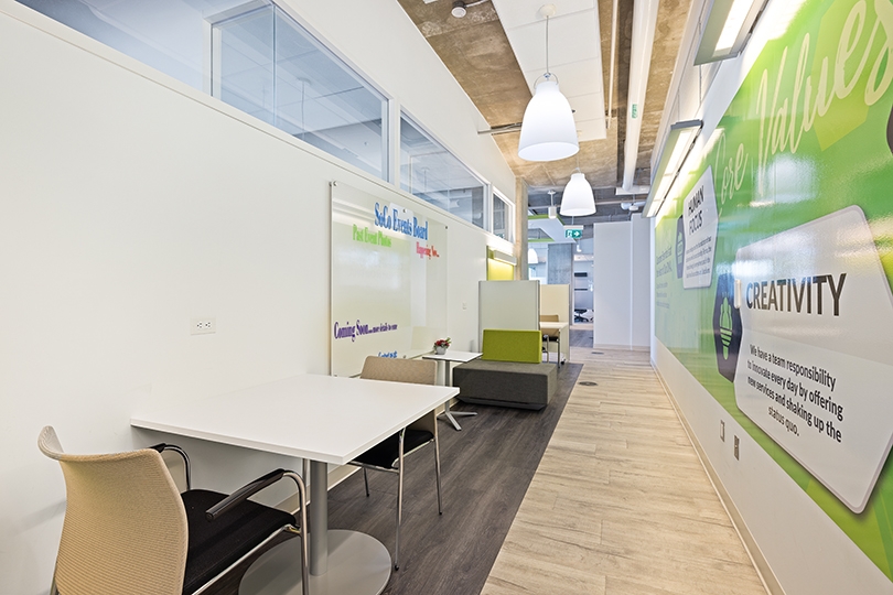 5015 Spectrum Way interior view of bright and open collaboration area features casual seating