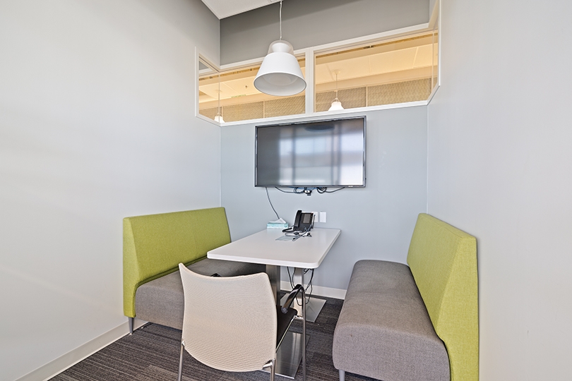 5015 Spectrum Way interior view of small meeting nook features built-in bench seating