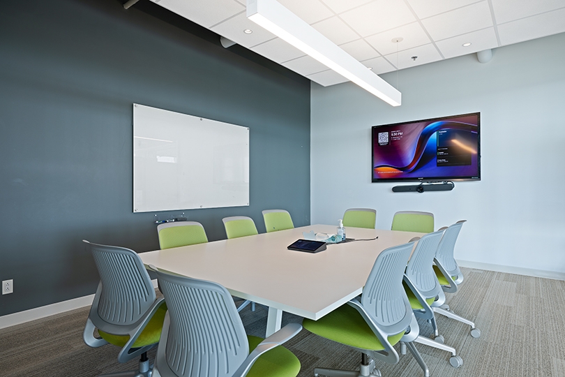 5015 Spectrum Way interior view of conference room with whiteboard and display