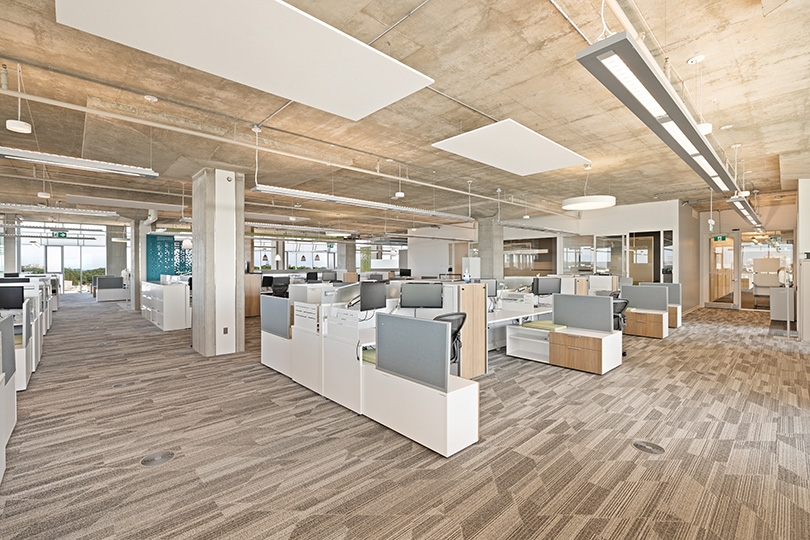 5015 Spectrum Way interior view of well-lit open office layout features modern workstations