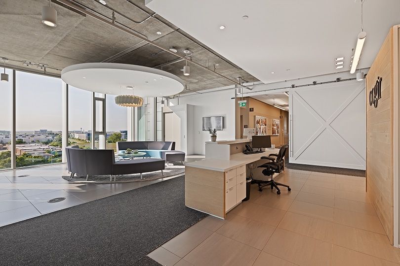 5015 Spectrum Way interior view of reception area features a clean, modern front desk