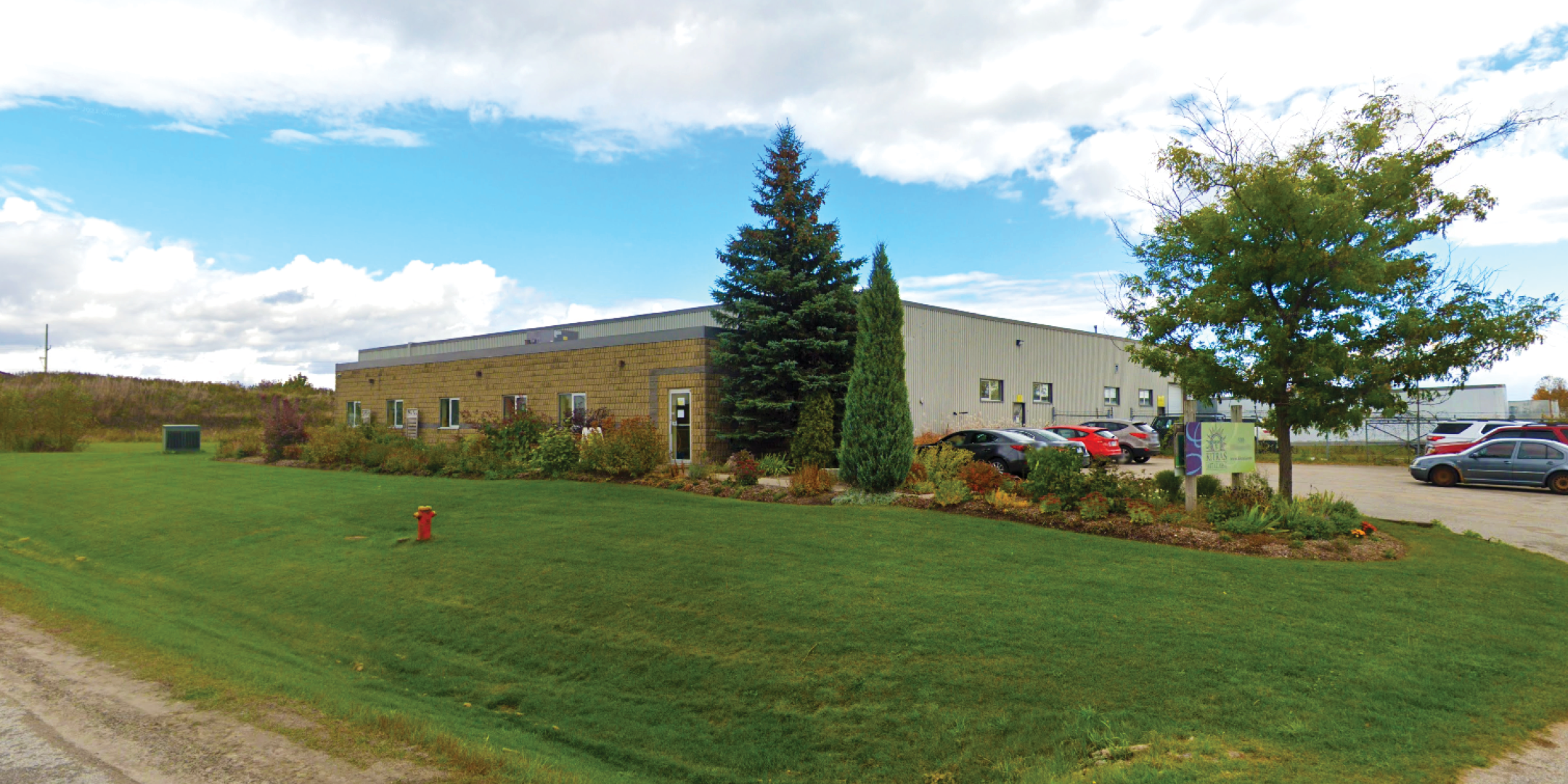 530 Dickson Dr exterior view of the building with trees around