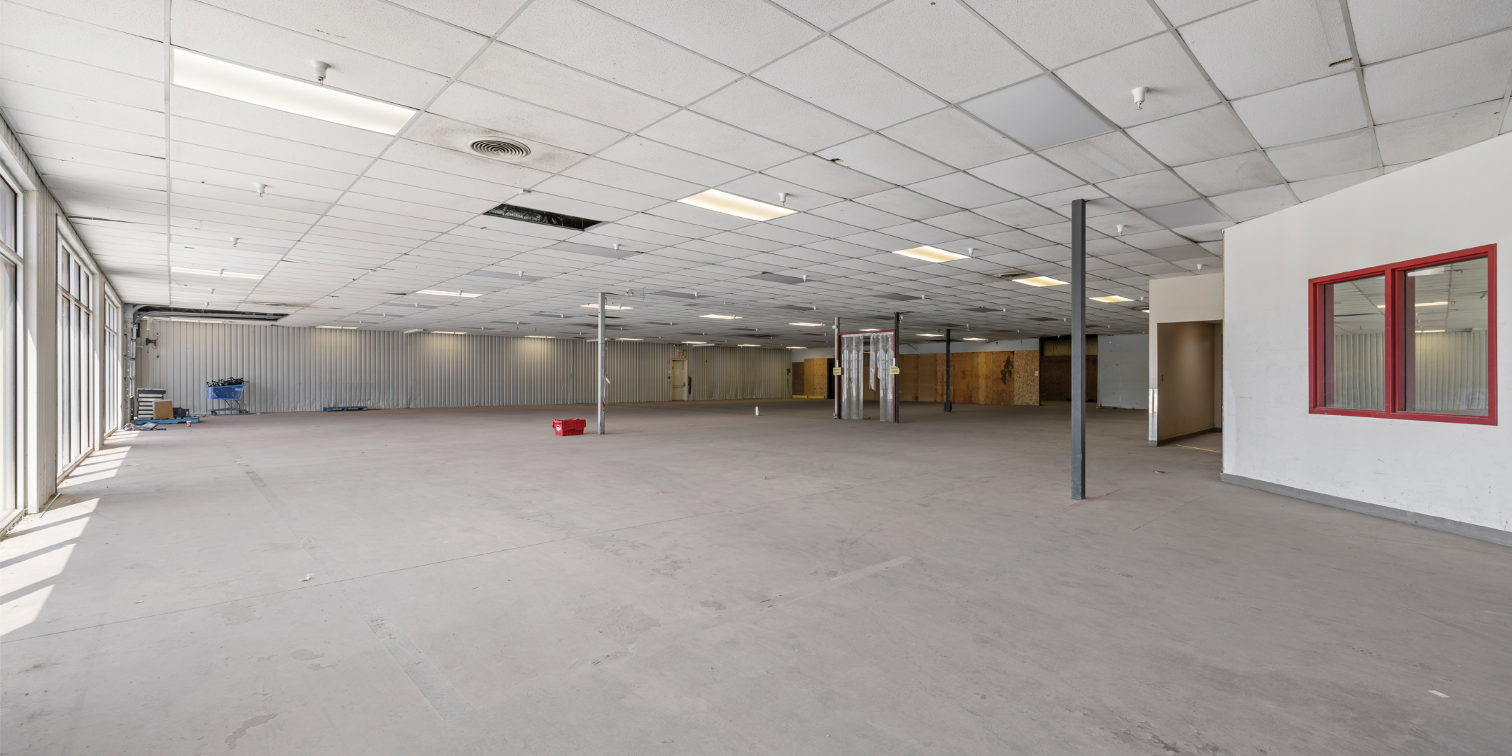 787 St. Clair Street, Chatham - Interior Warehouse Area with concrete flooring and bright lights