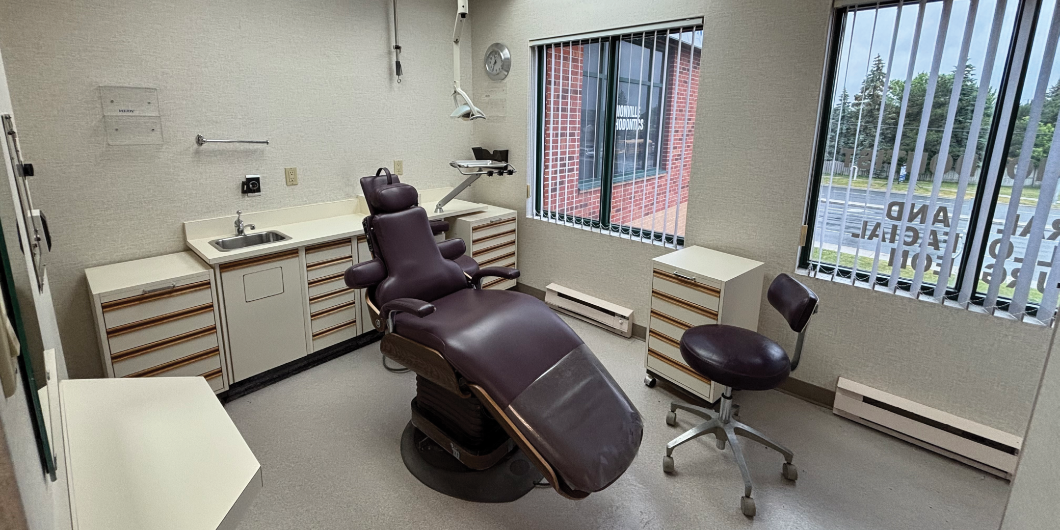 9249 Kennedy Road Medical Office Space with Medical chair, desk and 2 large windows, well lit