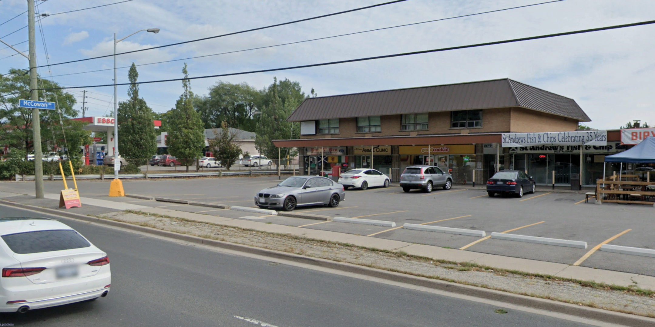 Front of 2 story commercial building with retail on bottom floor, and offices on 2nd floor