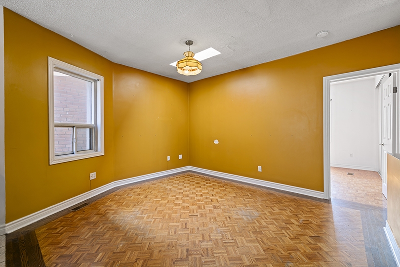 338 Kingston Road interior room with yellow painted walls