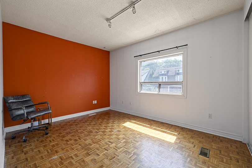 338 Kingston Road interior room with orange painted walls