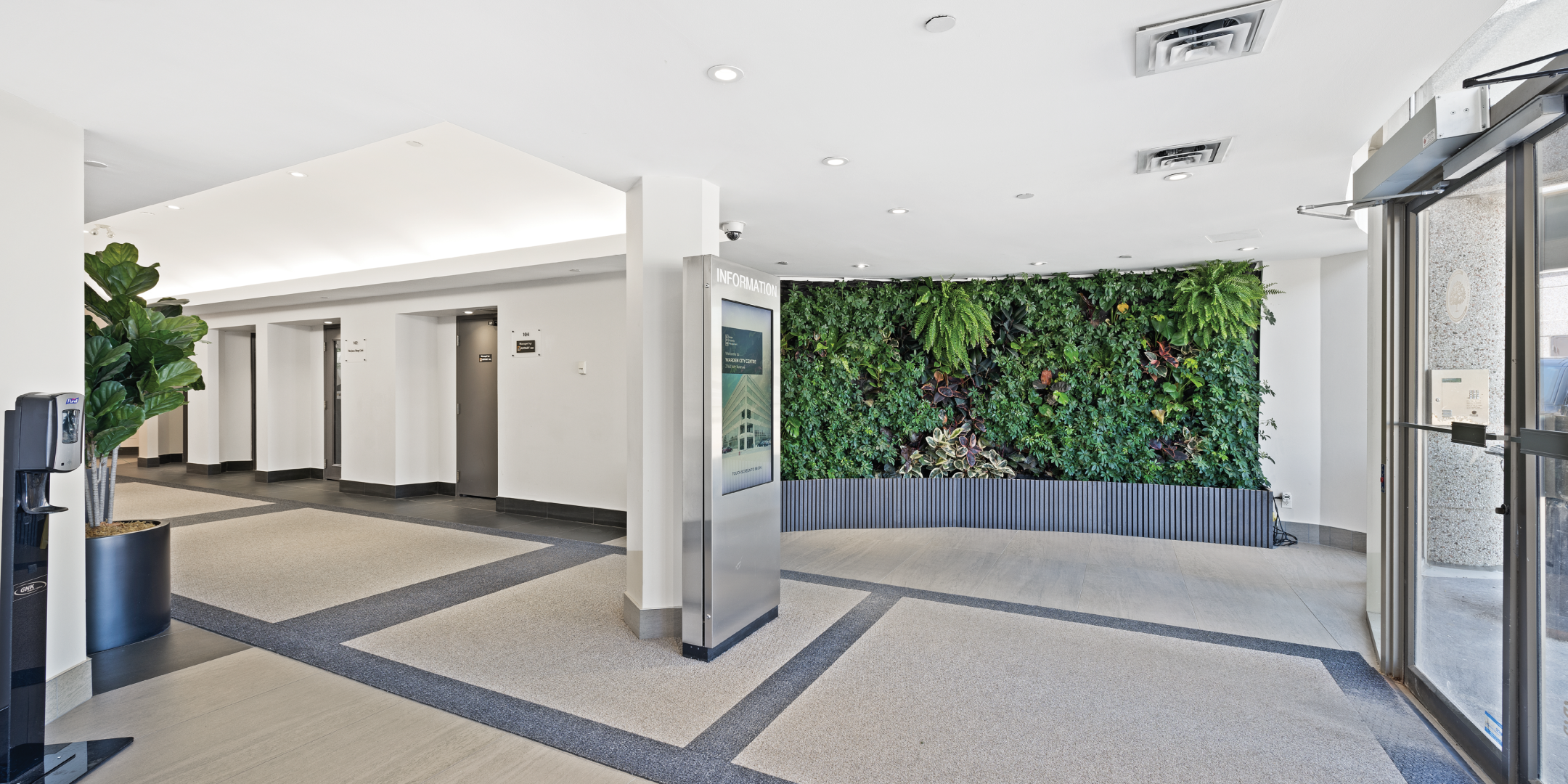 front lobby of office building with living wall