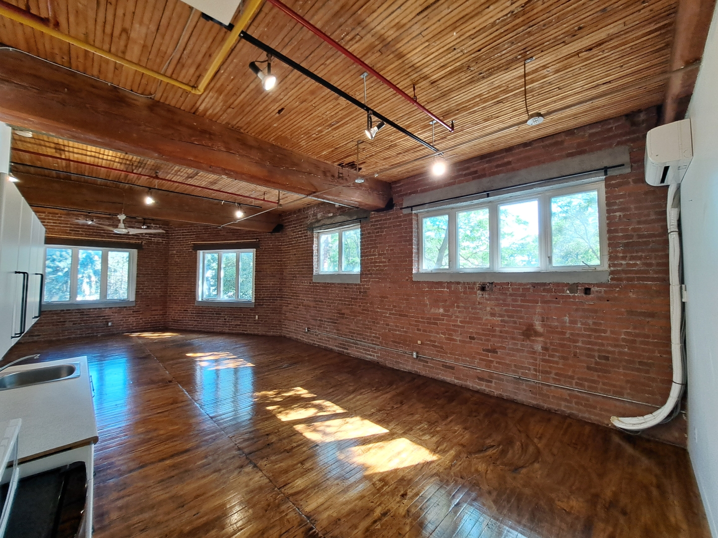 77 Florence Street Suite 201 unfurnished space with several windows