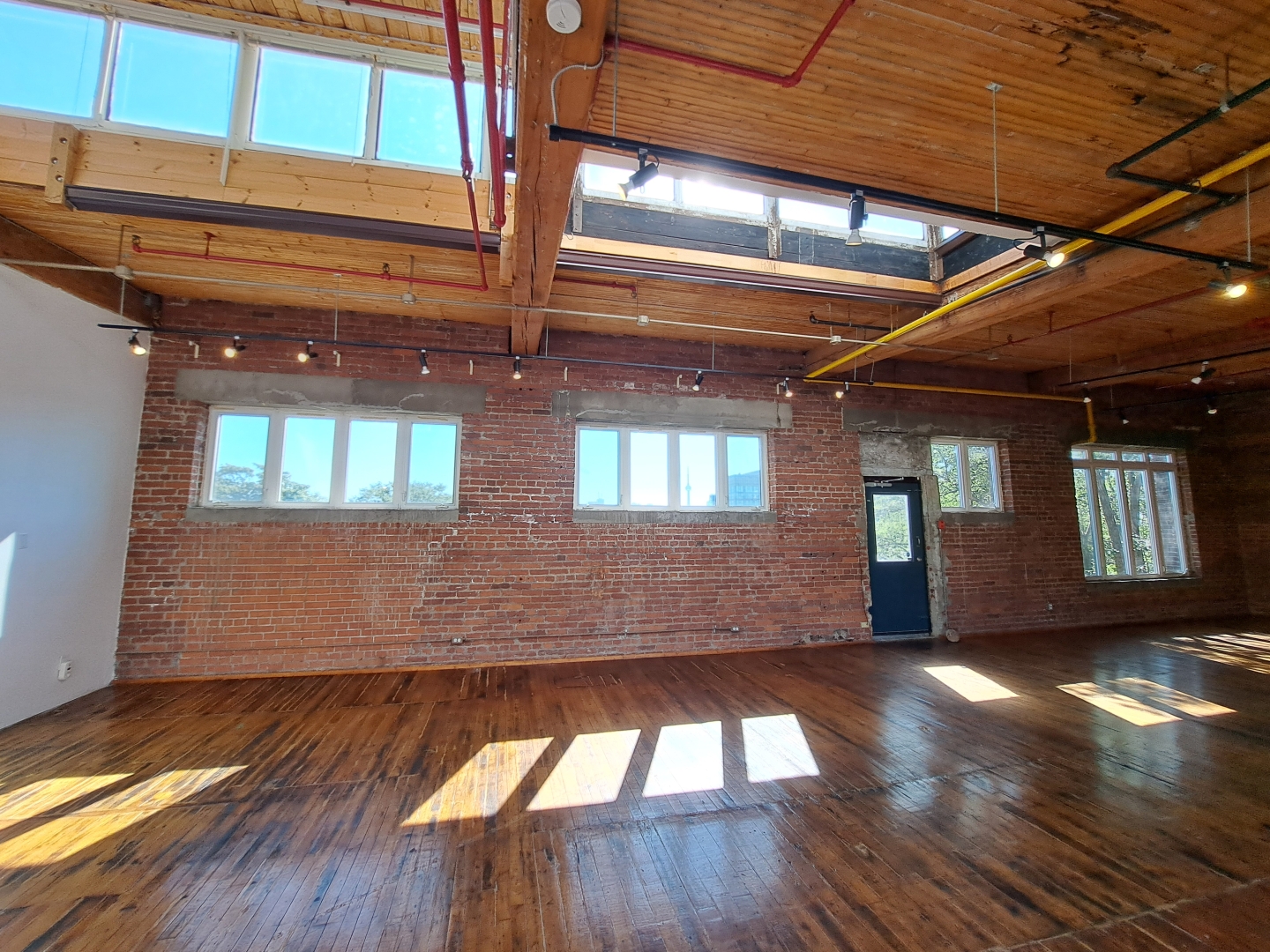 77 Florence Street Suite 304 unfurnished space with several windows