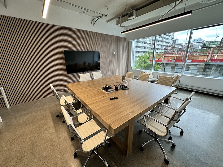1835 Yonge Street interior view of conference room with a large square table and big windows