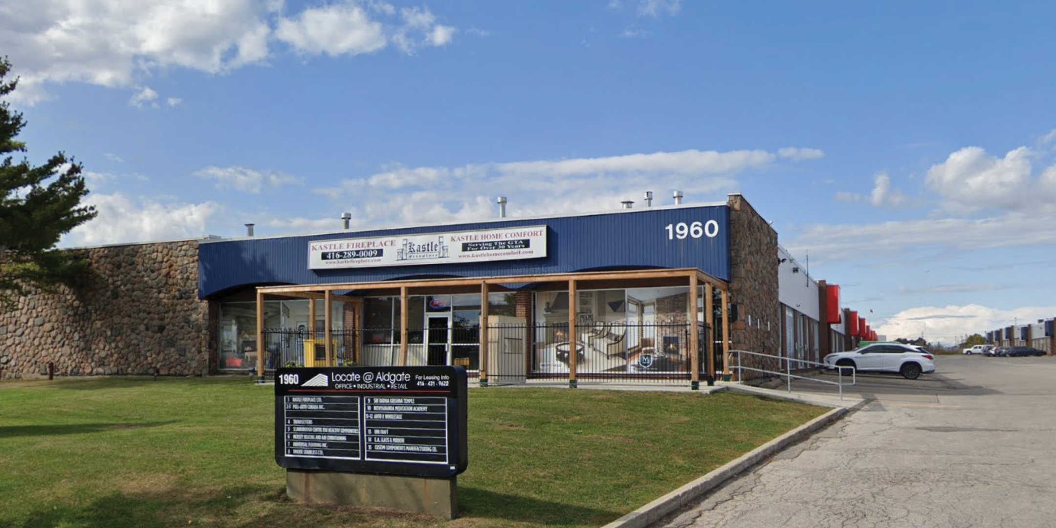 1960 Ellesmere Road Unit 4 Building Front Entrance with Building sign outfront
