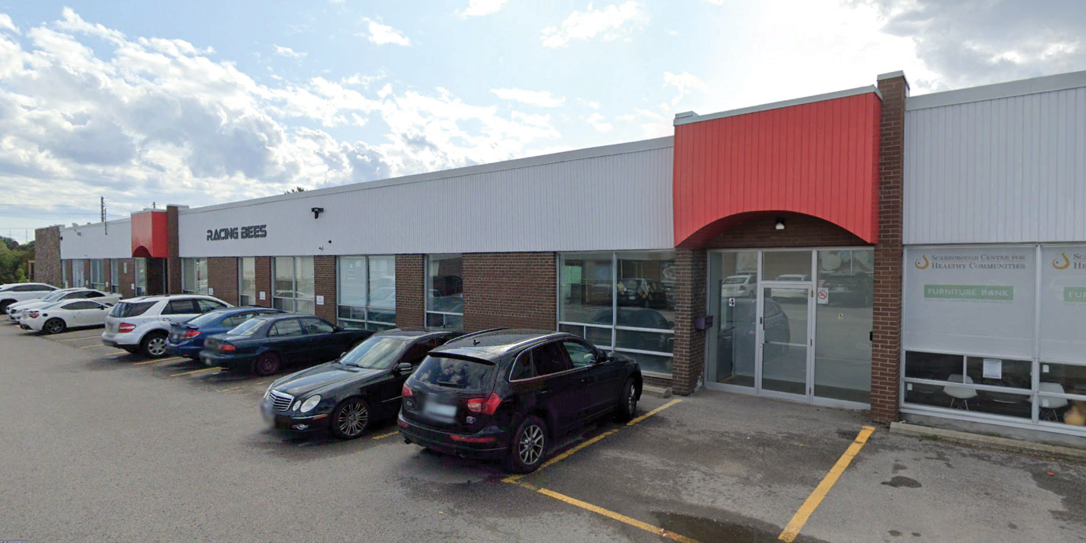 1960 Ellesmere Road Unit 4 Side of Building with parking lot