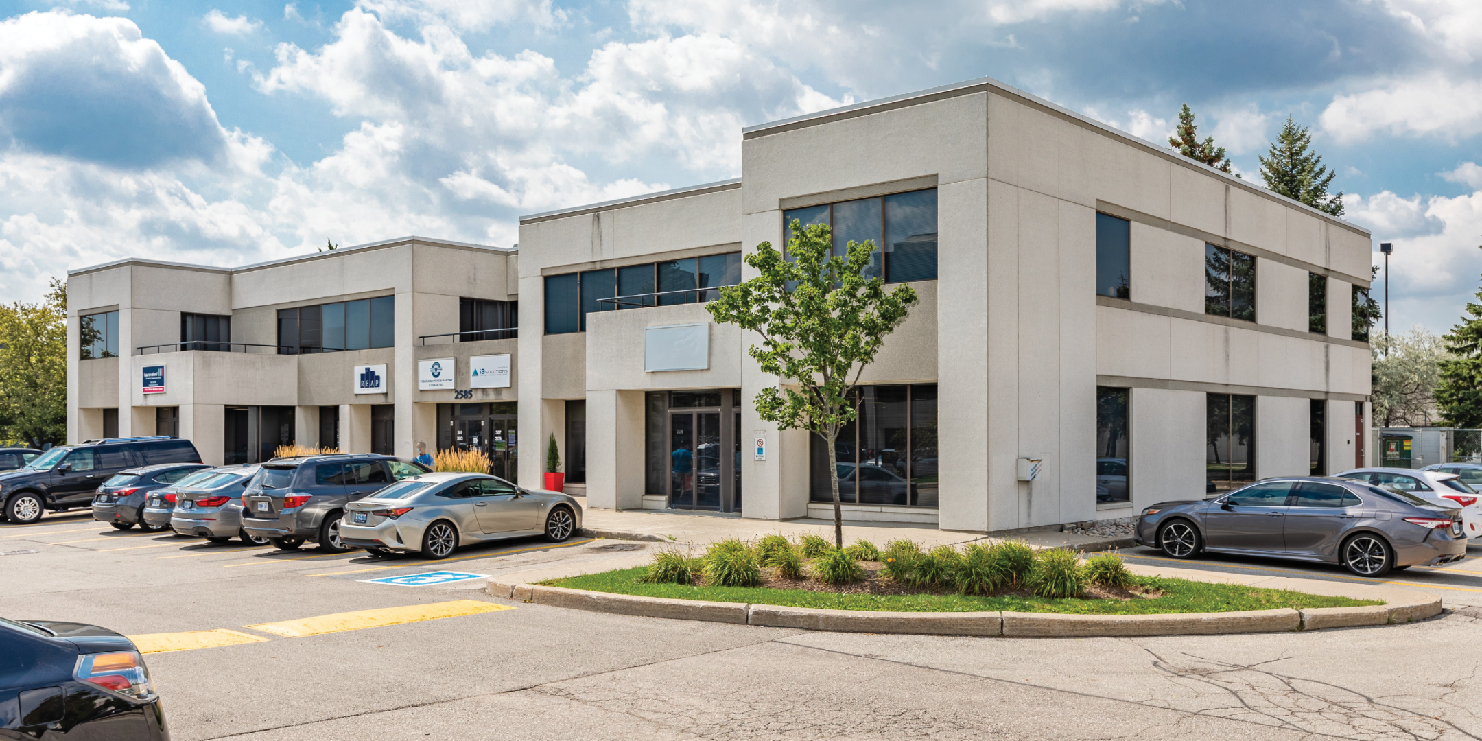2585 - 2595 Skymark Avenue Exterior with view of the parking lot 
