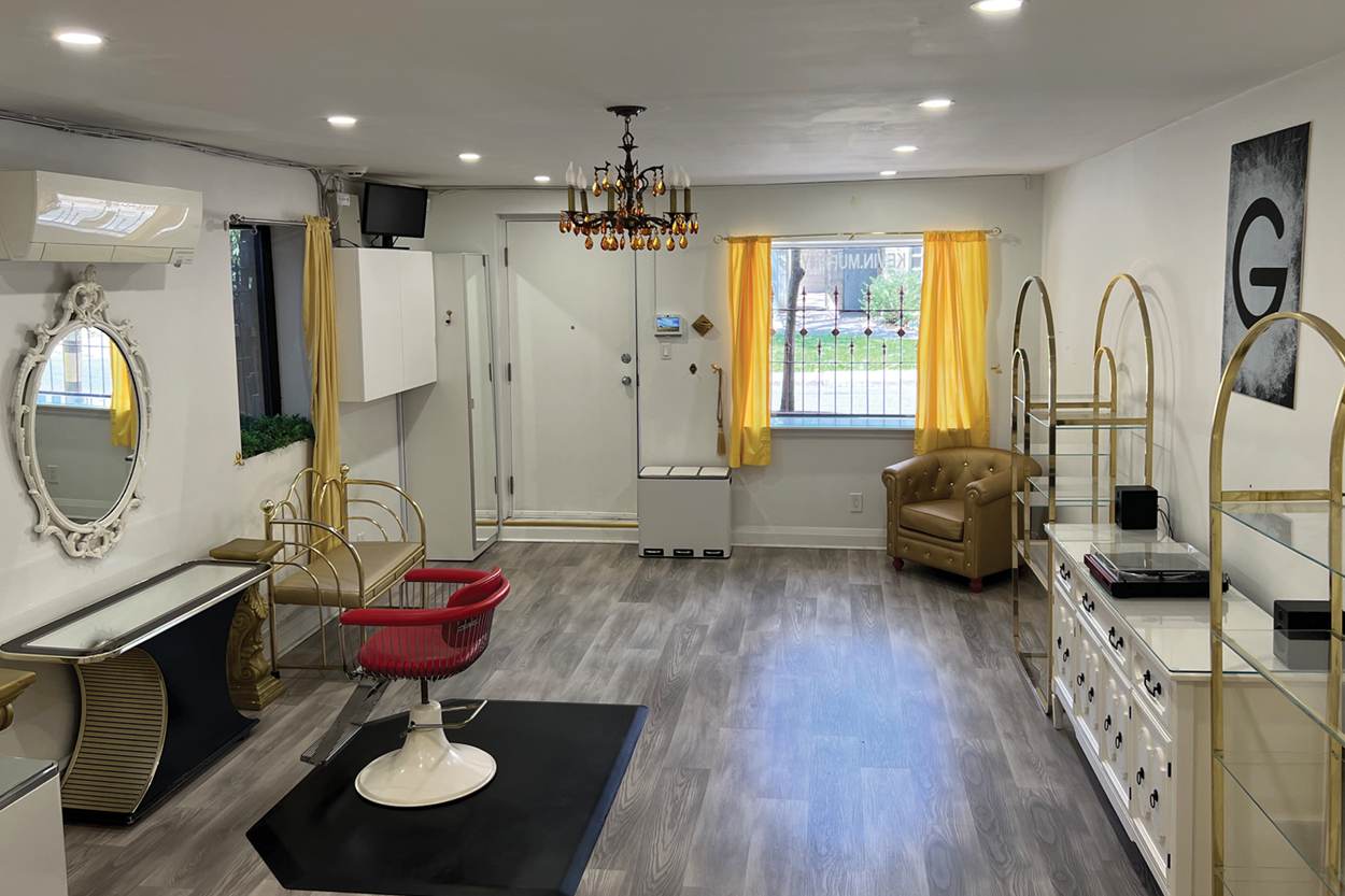 17 Stephanie Street front entrance area with yellow curtains and a chandelier